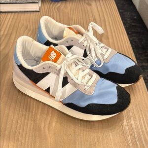 New Balance Blue and Black Sneakers